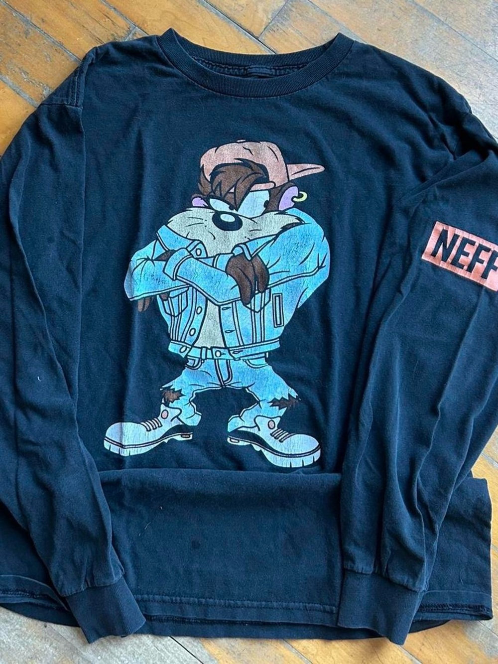 Disney Men’s Black Crewneck Sweater with Blue & Pink Taz Graphic